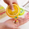 Pill Box Medicine Dispenser 7-Day Week Weekly Whee Cute Portable fruit style 7 grid seal rotation Pill Organizer Medicine Box